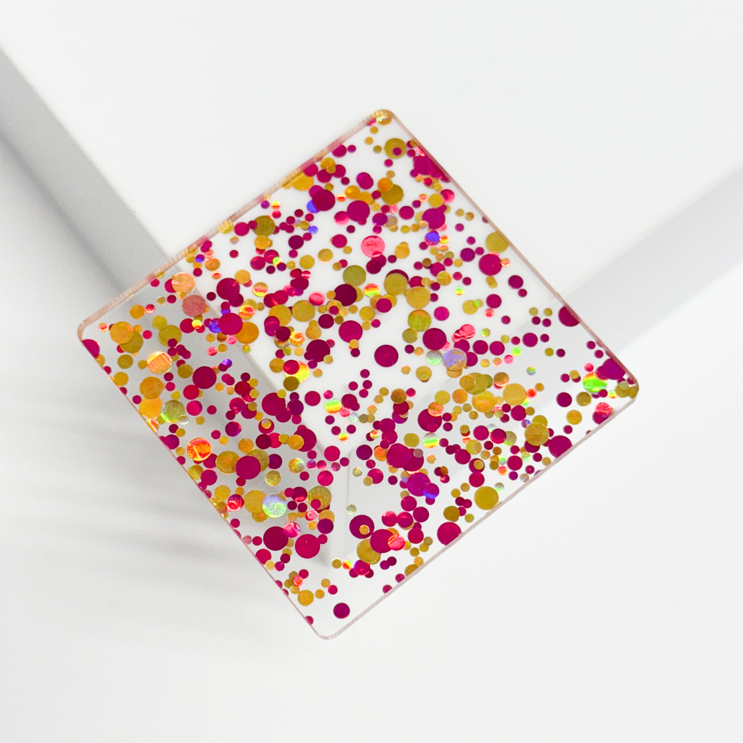 PMMA incoloro transparente con confeti rosa y dorado